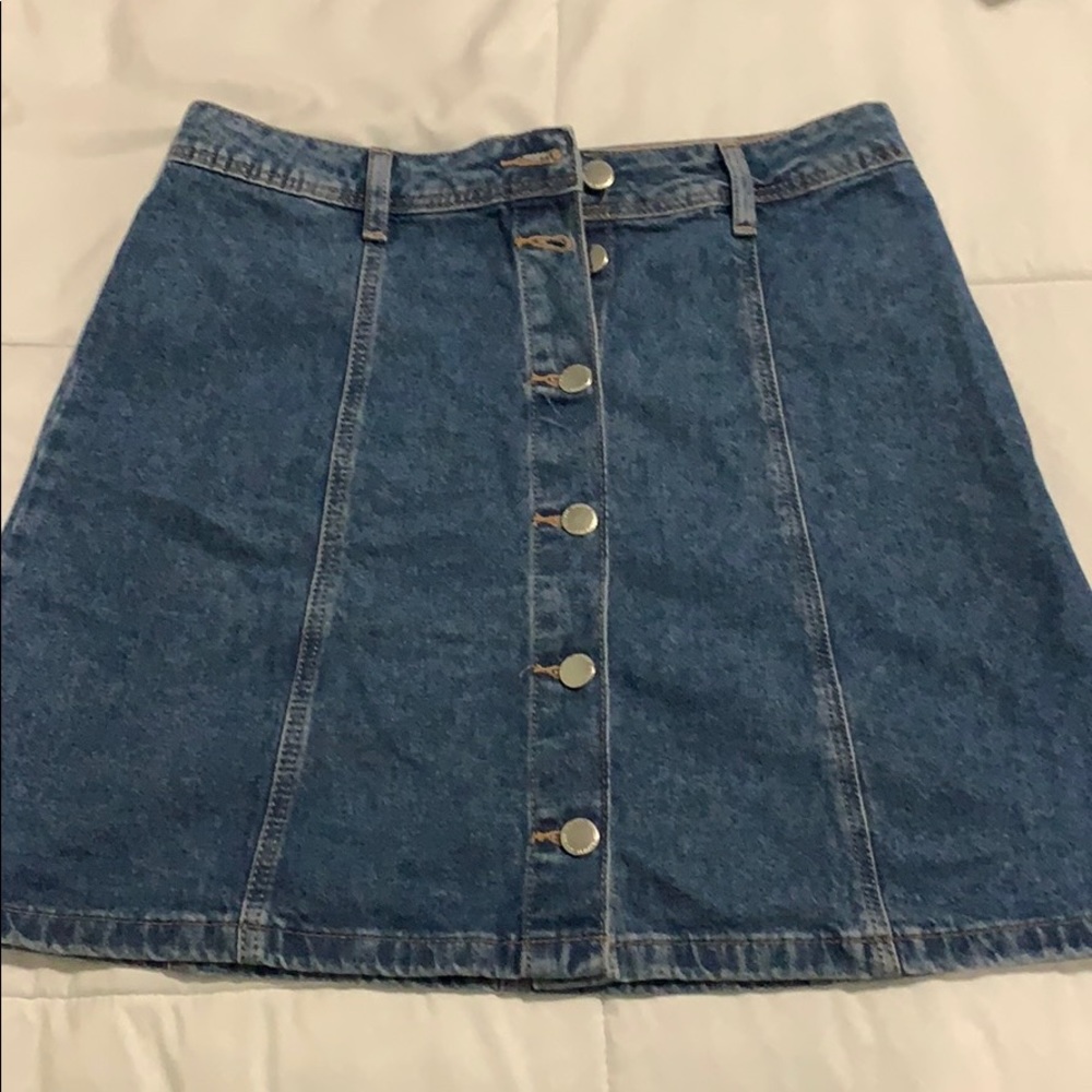 Blue Jean skirts with 6 silver buttons. Worn once